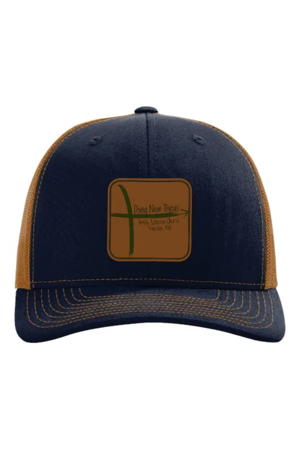 This Snapback Trucker Cap in Navy/Carmel — 